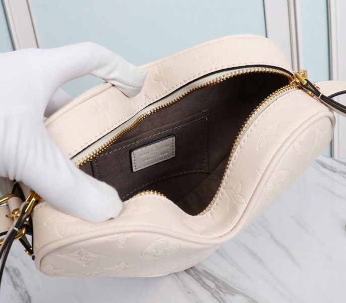 Louis Vuitton Monogram Empreinte Game On Coeur Bag In Cream angle 3