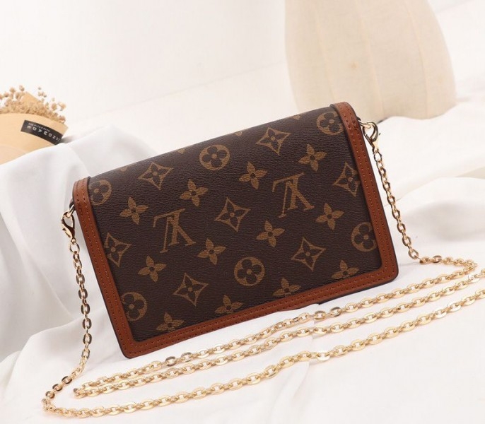 Louis Vuitton Monogram Reverse Canvas Dauphine Chain Wallet angle 3