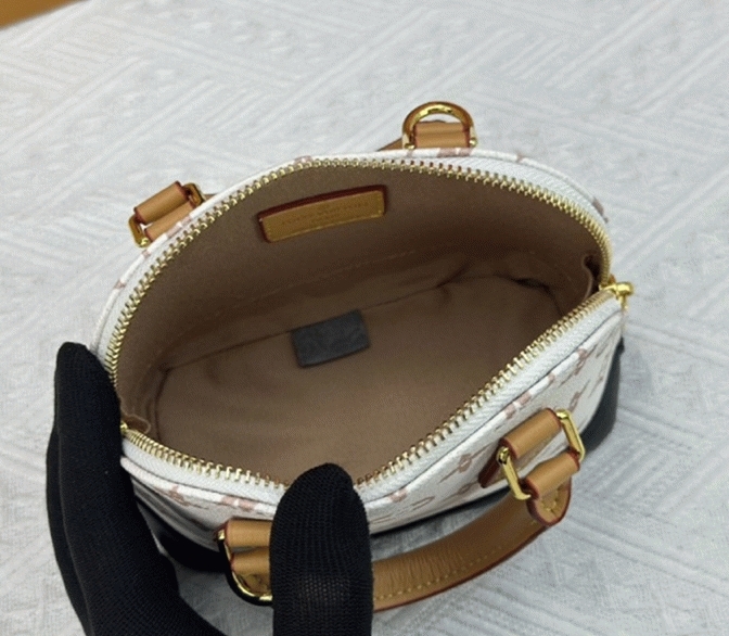 Louis Vuitton Monogram Dune Canvas Nano Alma Bag angle 4