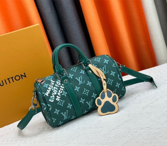Louis Vuitton Monogram Heritage Canvas Keepall Bandouliere 25 In Green angle 2