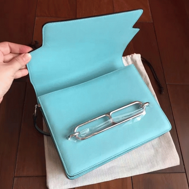 Blue atoll fake Hermes Mini Sac Roulis handbag angle 2