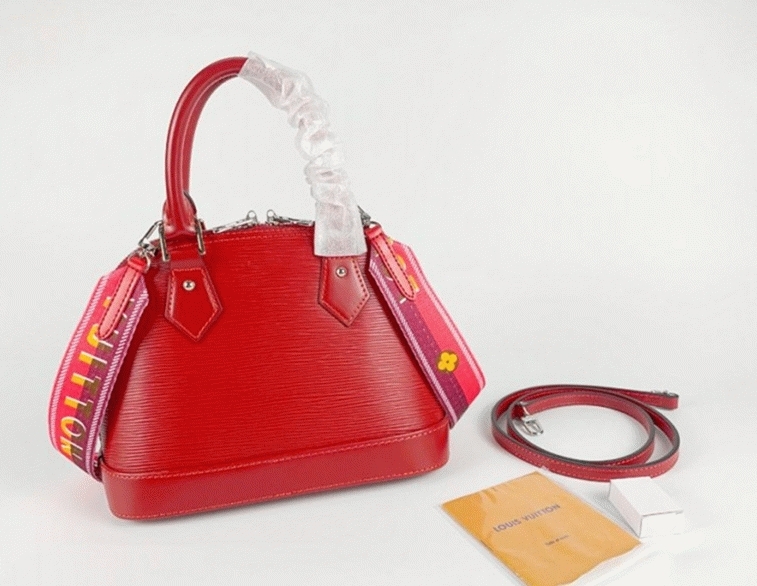Louis Vuitton Epi Leather Alma BB Handbag In Red With Jacquard Strap angle 5
