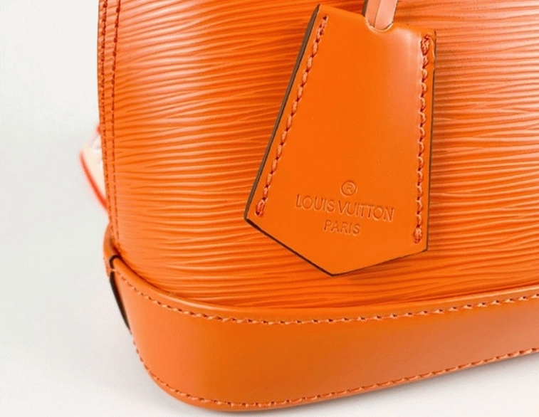 Louis Vuitton Epi Leather Alma BB Handbag In Orange With Jacquard Strap angle 2