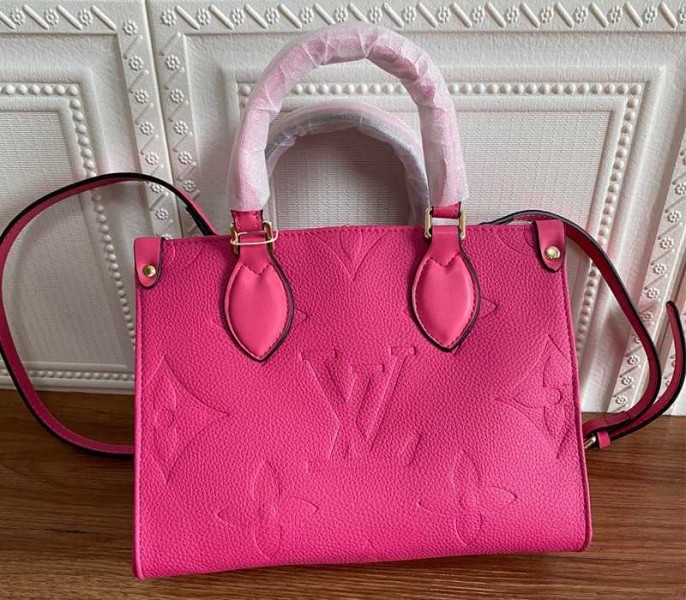 Louis Vuitton Monogram Empreinte Leather Onthego PM Bag In Freesia Pink angle 3