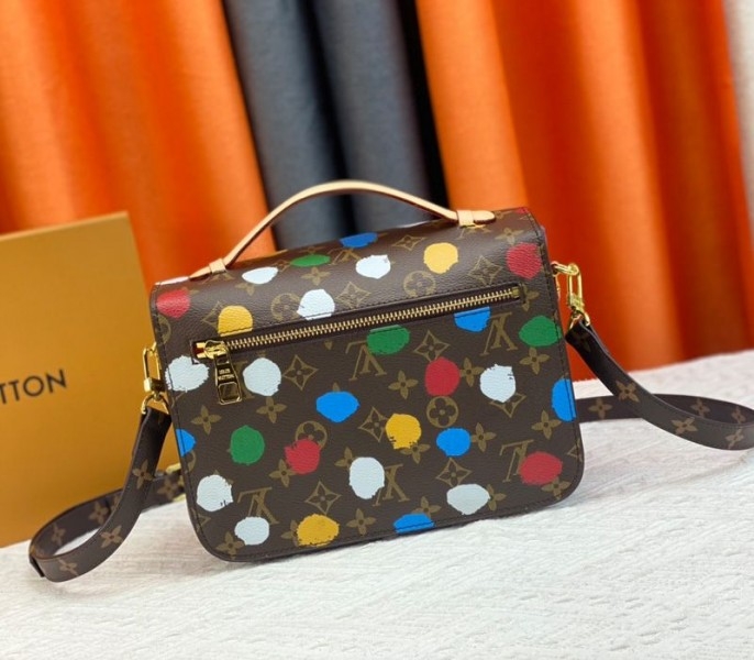 Louis Vuitton X YK Monogram Canvas Metis Handbag angle 3