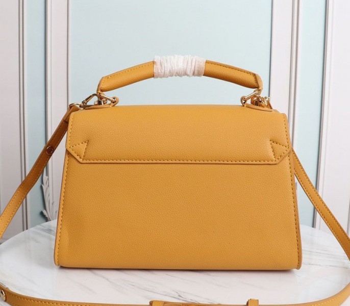 Louis Vuitton Twist One Handle MM Handbag In Vibrant Honey angle 3