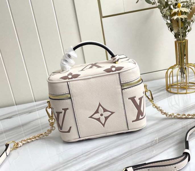 Louis Vuitton Bicolor Monogram Empreinte Vanity PM Bag In Cream And Bois De Rose Pink angle 4