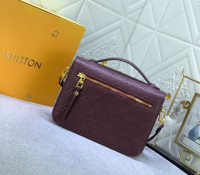 LV Monogram Empreinte Leather Metis In Wine angle 3