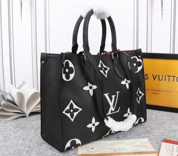 Louis Vuitton Monogram Empreinte OnTheGo MM Tote In Black angle 2