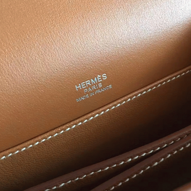Caramel replica Hermes Mini Sac Roulis handbag angle 5